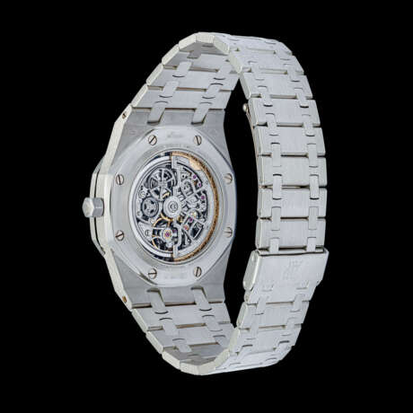 AUDEMARS PIGUET. A RARE PLATINUM AUTOMATIC SKELETONISED PERPETUAL CALENDAR WRISTWATCH WITH MOON PHASES AND BRACELET - фото 2