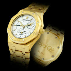 AUDEMARS PIGUET. AN 18K GOLD AUTOMATIC DUAL TIME WRISTWATCH WITH DATE, POWER RESERVE AND BRACELET