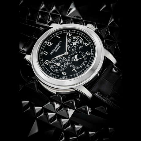 PATEK PHILIPPE. A RARE PLATINUM AUTOMATIC “CATHEDRAL” MINUTE REPEATING PERPETUAL CALENDAR WRISTWATCH WITH MOON PHASES, 24 HOUR AND LEAP YEAR INDICATION - photo 1