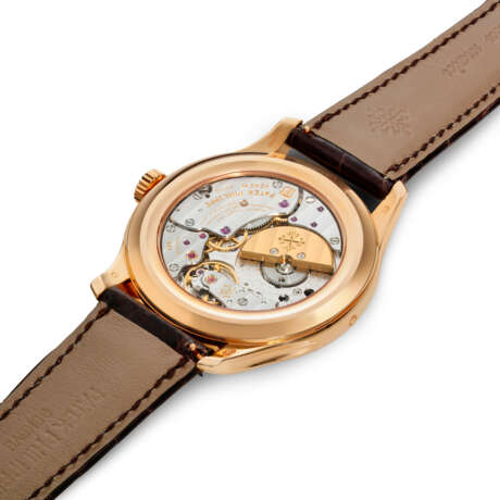 PATEK PHILIPPE. AN 18K PINK GOLD AUTOMATIC PERPETUAL CALENDAR WRISTWATCH WITH MOON PHASES, 24 HOUR, LEAP YEAR INDICATION AND BREGUET NUMERALS - photo 3