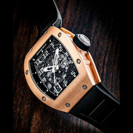RICHARD MILLE. AN 18K PINK GOLD AUTOMATIC SEMI-SKELETONISED WRISTWATCH WITH SWEEP CENTRE SECONDS AND DATE - фото 1