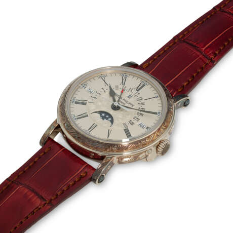 PATEK PHILIPPE. AN 18K WHITE GOLD AUTOMATIC PERPETUAL CALENDAR WRISTWATCH WITH SWEEP CENTRE SECONDS, RETROGRADE DATE, MOON PHASES AND LEAP YEAR INDICATION - Foto 2