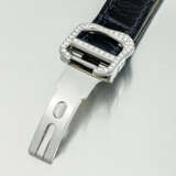 CARTIER. A PLATINUM AND DIAMOND-SET LIMITED EDITION SKELETONISED ASYMMETRICAL WRISTWATCH - фото 4