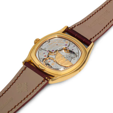 PATEK PHILIPPE. AN 18K GOLD AUTOMATIC PERPETUAL CALENDAR CUSHION-SHAPED WRISTWATCH WITH MOON PHASES, 24 HOUR, LEAP YEAR INDICATION AND BREGUET NUMERALS - photo 3
