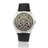 PATEK PHILIPPE. A PLATINUM AUTOMATIC WRISTWATCH WITH HAND-ENGRAVED BLACK CHAMPLEV&#201; ENAMEL DIAL - photo 1