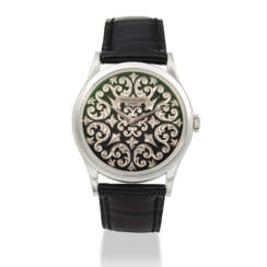 PATEK PHILIPPE. A PLATINUM AUTOMATIC WRISTWATCH WITH HAND-ENGRAVED BLACK CHAMPLEV&#201; ENAMEL DIAL