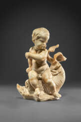 A MARBLE GROUP OF A PUTTO ON A DOLPHIN