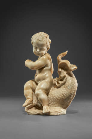 A MARBLE GROUP OF A PUTTO ON A DOLPHIN - photo 3