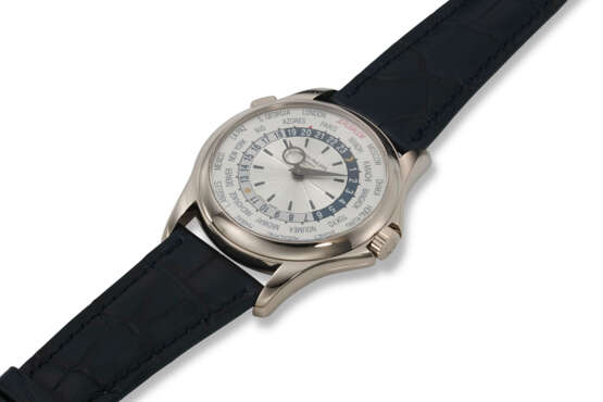 PATEK PHILIPPE, REF. 5130G-023, A VERY FINE 18K WHITE GOLD WORLD TIME WRISTWATCH WITH COMMISIONED “JERUSALEM DIAL" - photo 2