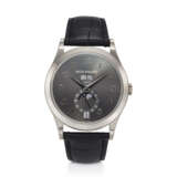 PATEK PHILIPPE, REF. 5396G-014, A VERY FINE 18K WHITE GOLD ANNUAL CALENDAR WRISTWATCH WITH MOON PHASES - Foto 1