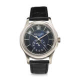 PATEK PHILIPPE, REF. 5205G-013, A FINE 18K WHITE GOLD ANNUAL CALENDAR WRISTWATCH WITH MOON PHASES - Foto 1