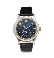PATEK PHILIPPE, REF. 5205G-013, A FINE 18K WHITE GOLD ANNUAL CALENDAR WRISTWATCH WITH MOON PHASES