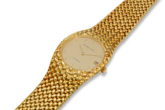 AUDEMARS PIGUET, REF. 5403, A FINE AND RARE 18K YELLOW GOLD WRISTWATCH ON BRACELET WITH DIAMOND DIAL AND DATE - Foto 2