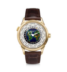 PATEK PHILIPPE, REF. 5231J-001, A FINE 18K YELLOW GOLD WORLD TIME WRISTWATCH WITH CLOISONN&#201; ENAMEL DIAL DEPICTING THE AMERICAS, EURASIA, AND AFRICA