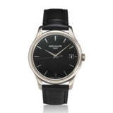 PATEK PHILIPPE, REF. 5227G-010, A FINE BLACK DIAL 18K WHITE GOLD WRISTWATCH WITH DATE AND OFFICER’S CASEBACK - фото 1