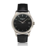 PATEK PHILIPPE, REF. 5227G-010, A FINE BLACK DIAL 18K WHITE GOLD WRISTWATCH WITH DATE AND OFFICER’S CASEBACK - Foto 1