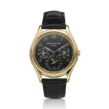 PATEK PHILIPPE, REF. 3940J, A UNIQUE 18K YELLOW GOLD PERPETUAL CALENDAR WRISTWATCH WITH LEAP YEAR INDICATOR AND MOON PHASES, COMMISIONED BY MICHAEL OVITZ - photo 2