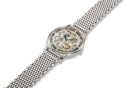 PATEK PHILIPPE, REF. 5180/1G-010, A FINE AND RARE 18K WHITE GOLD SKELETONISED WRISTWATCH ON BRACELET, RETAILED BY TIFFANY & CO. - Foto 2