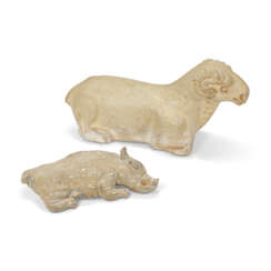 A STRAW-GLAZED MOULDED POTTERY FIGURE OF A RECUMBENT RAM AND A WHITE-GLAZED POTTERY OF A RECUMBENT BOAR