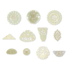 A GROUP OF ELEVEN WHITE AND PALE CELADON JADE OPENWORK ORNAMENTS