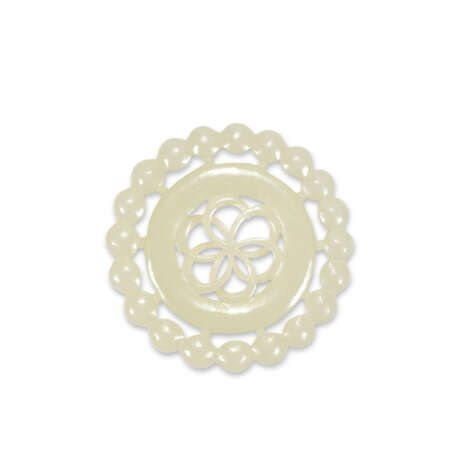 A GROUP OF ELEVEN WHITE AND PALE CELADON JADE OPENWORK ORNAMENTS - photo 3