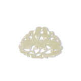 A GROUP OF ELEVEN WHITE AND PALE CELADON JADE OPENWORK ORNAMENTS - photo 6