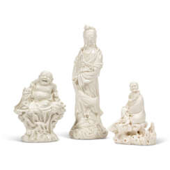 A GROUP OF THREE DEHUA FIGURES: A BUDHAI, A GUANYIN AND A LUOHAN