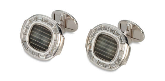 PATEK PHILIPPE, A PAIR OF 18K WHITE GOLD AND DIAMOND NAUTILUS CUFFLINKS - photo 1