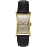 PATEK PHILIPPE, REF. 1593, “HOUR GLASS” AN 18K YELLOW GOLD RECTANGULAR SHAPED WRISTWATCH WITH SUBSIDIARY SECONDS - photo 1