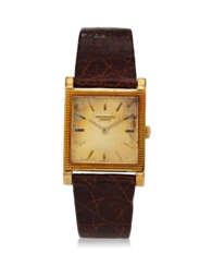 PATEK PHILIPPE, REF. 3465, “POSTAGE STAMP”, A SQUARE SHAPED 18K YELLOW GOLD WRISTWATCH WITH CLOUS DE PARIS FINISHED DIAL AND BEZEL 