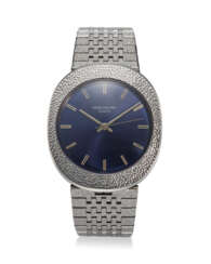 PATEK PHILIPPE, REF. 3580, ELLIPSE, A RARE STEEL OVAL HAMMERED METAL DECORATION DRESS WATCH