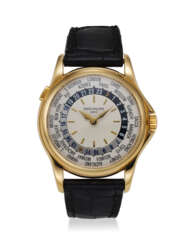 PATEK PHILIPPE, REF. 5110J-001, AN 18K YELLOW GOLD WORLD TIME WRISTWATCH WITH GUILLOCHE DIAL 