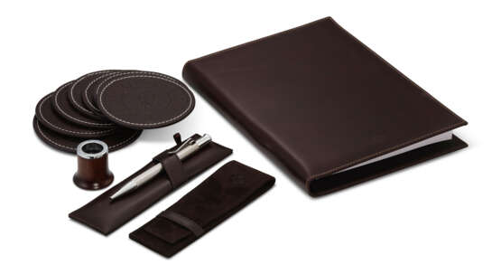 PATEK PHILIPPE, LEATHER COASTERS, PEN, NOTEBOOK, AND LOUPE - photo 1