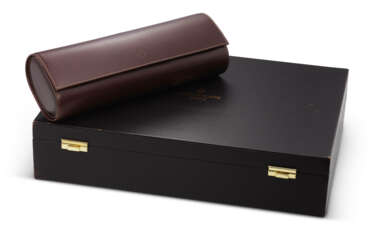 PATEK PHILIPPE, A BROWN LEATHER TRAVEL CASE AND WATCH PRESENTATION BRIEFCASE 