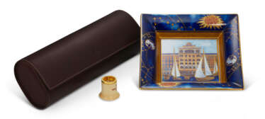 PATEK PHILIPPE, PORCELAIN DISH, A LEATHER TRAVEL CASE AND LOUPE 