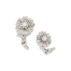 TWO MID 20TH CENTURY DIAMOND FLOWER BROOCHES