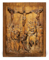 A GILT-FRUITWOOD, PROBABLY PEAR, RELIEF OF THE CRUCIFIXION