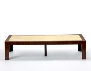 Déco style living room table with veneered wood structure, top covered in parchment. Italy, 20th century. (190x43.5x90 cm.) (defects and restorations)
