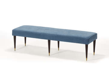 Six-legged bench in turned solid wood with brass tips, padded seat covered in blue fabric. Italy, 1950s. (145x40x45 cm.) (slight defects and restoration)