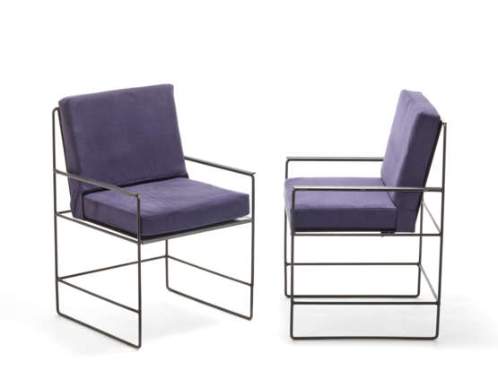 Pair of outdoor armchairs with black painted iron structure and removable cushions covered in blue fabric. - фото 1