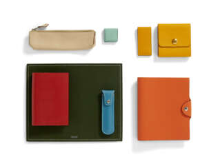 A SET OF EIGHT: A VERT CRU & VERT OLIVE SWIFT LEATHER MOUSEPAD, AN ORANGE H CLÉMENCE LEATHER ULYSSE NOTEBOOK, A ROUGE VIF COURCHEVEL LEATHER NOTEBOOK WITH ADDRESSBOOK, A JAUNE COURCHEVEL POST IT NOTE COVER, A BLEU JEAN COURCHEVEL LEATHER WHISTLE CASE WITH