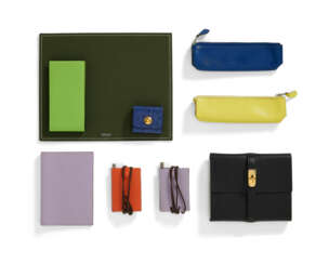A SET OF TEN: A BLACK SWIFT LEATHER KELLY NOTEBOOK, A SET OF TWO CHÈVRE LEATHER NOTEBOOK NECKLACES WITH PEN, A SET OF TWO PENCIL CASES, AN OSTRICH MINI POST-IT NOTE HOLDER, A VERT CRU LEATHER THIN NOTEBOOK WITH CASE, A VERT FONCÉ LEATHER MOUSEPAD AND A LI