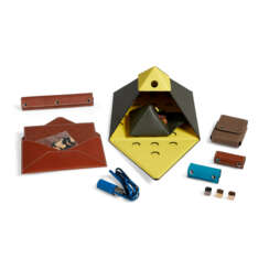 A SET OF SEVEN GAMES: A LIME & ETAIN LEATHER SOLITAIRE, A LEATHER MINI TRAVEL CHESS SET, A JEAU DU CADENAS CUIR SET, A MIKADO PICK-UP STICKS GAME, A KALEIDOSCOPE, A LEATHER DECK OF CARDS CARRYING CASE AND A SET OF THREE DICE IN LEATHER CASE