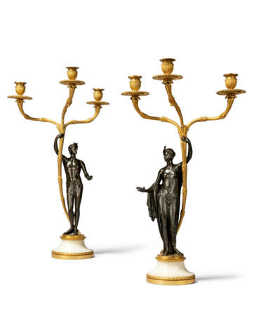 A PAIR OF GEORGE III ORMOLU, PATINATED-BRONZE AND WHITE MARBLE `APOLLO AND DIANA` CANDELABRA - photo 1