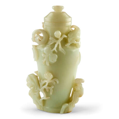 A PALE CELADON JADE 'PHOENIX' VASE AND COVER - photo 1