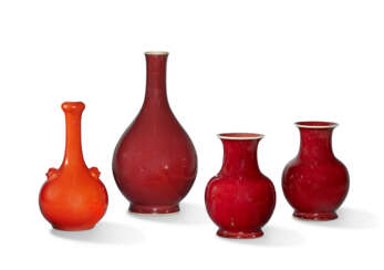 THREE COPPER-RED-GLAZED VASES AND A CORAL-GLAZED VASE