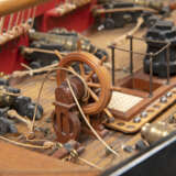 A FULLY RIGGED STAINED AND PAINTED WOOD MODEL OF A TWO-MASTED 19TH CENTURY TRADING BRIG - фото 4
