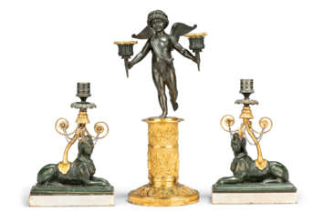 A PAIR OF REGENCY ORMOLU AND PATINATED-BRONZE-MOUNTED BRONZED-COMPOSITION CANDLESTICKS AND A PATINATED-BRONZE AND ORMOLU TWIN BRANCH CANDELABRUM 