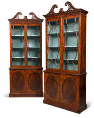 A PAIR OF GEORGE III-STYLE AFRICAN MAHOGANY BOOKCASES 