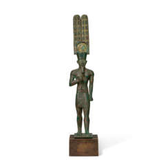 AN EGYPTIAN GOLD-INLAID BRONZE AMUN